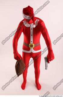 09 2019 01 JOEL ADAMSON CHRISTMASVILLAIN WITH GUN AND BAG